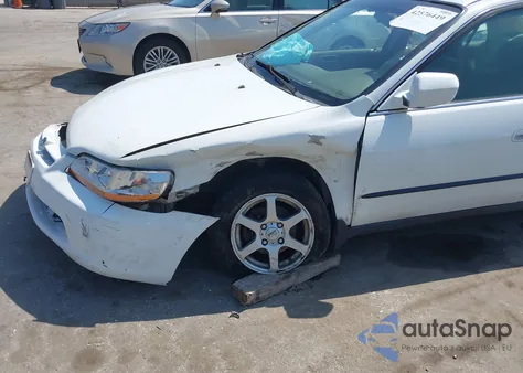 1999 Honda Accord Lx from USA, damaged, VIN 1HGCG6653XA116202